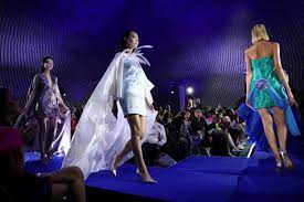 Pierre Cardin turns Communist Party HQ blue for Paris Fashion Week
