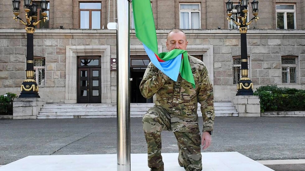 Azerbaijan leader raises national flag in Karabakh capital
