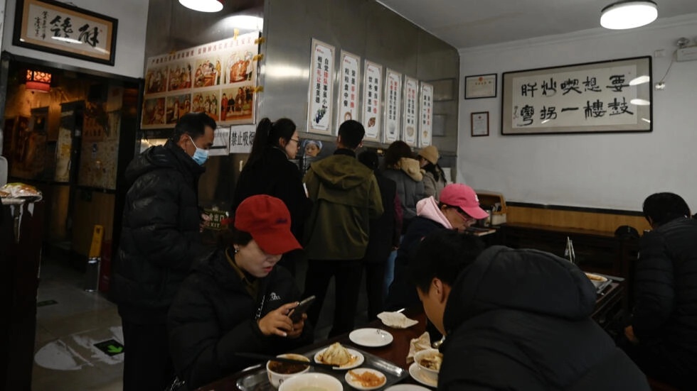 At Biden’s ‘noodle diplomacy’ eatery, Chinese eye warming US ties