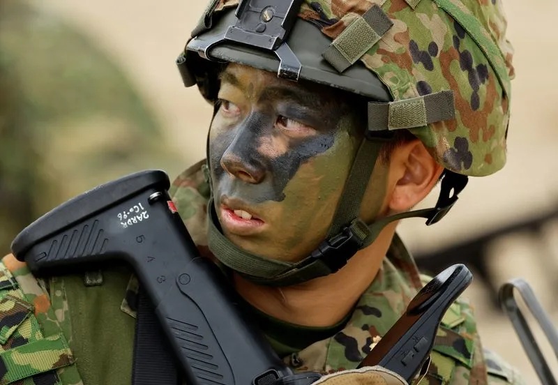 Japanese troops drill on island seen as vulnerable to China