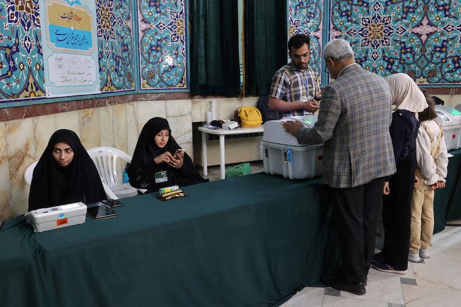 Iran conservatives tighten grip in parliament vote