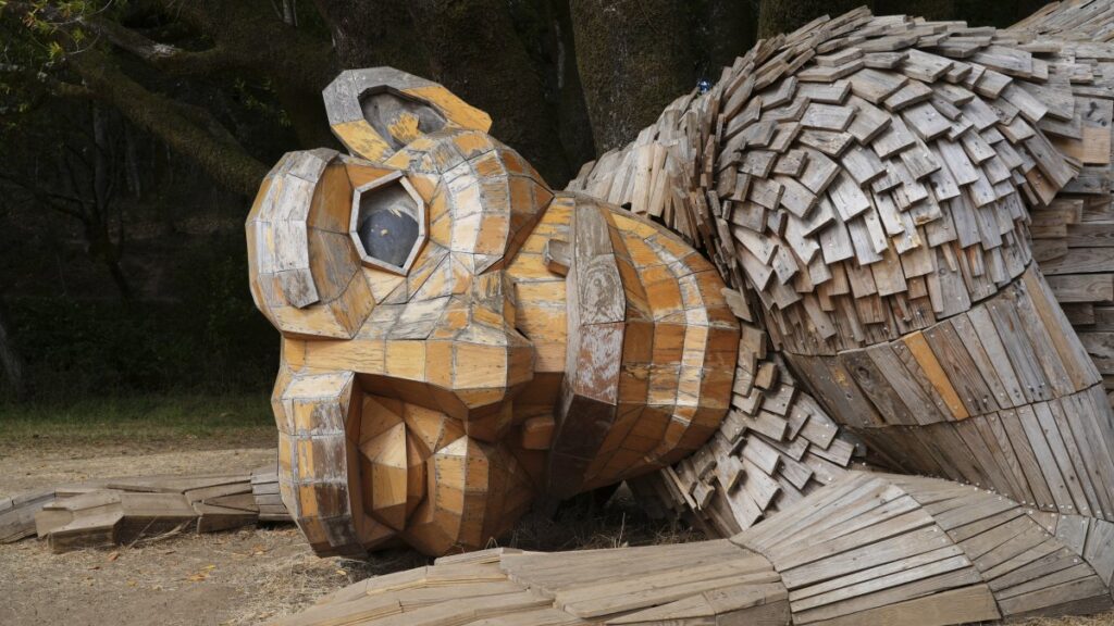 Wooden trolls made from trash urge humans to protect planet